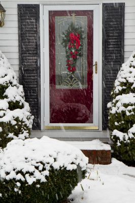 Stained Front Door with Holiday Decorations